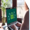 Laptop showing a website with a green lock