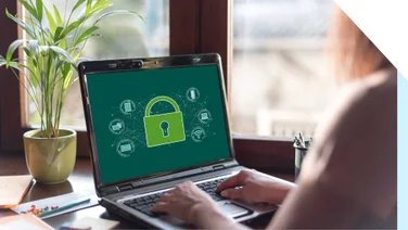 Laptop showing a website with a green lock