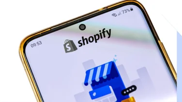 phone with Shopify logo on the screen