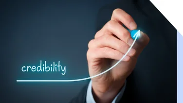 Pen guiding a line upwards marked "credibility"