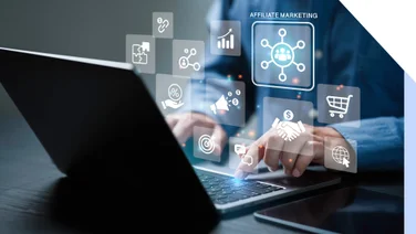 hands typing on laptop with hologram of affiliate marketing images floating above
