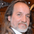 Tracey Brinkmann headshot wearing a shiny suit jacket