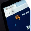 Closeup of the Bitly logo on a website header