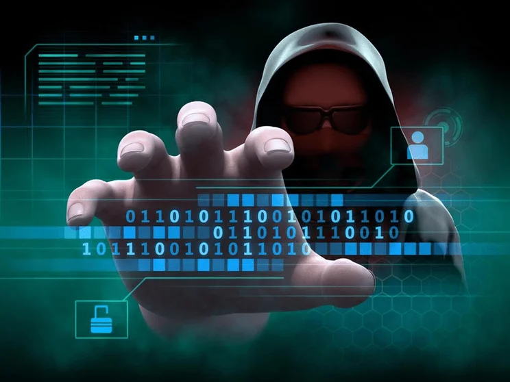 scary hacker man reaching out to grab code with his malicious fingers