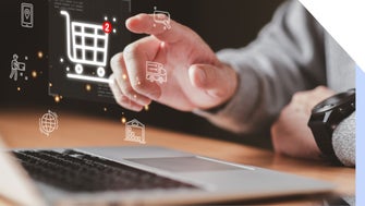 Hand pointing at floating ecommerce icons including a shopping cart