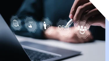 A person uses a stylus on a digital interface displaying icons for online reputation management and user feedback tools.