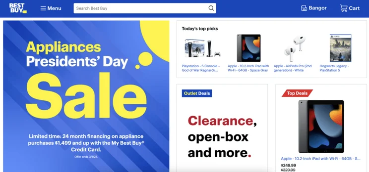 Best Buy's homepage featuring products for sale and a large ad for a President Day's sale