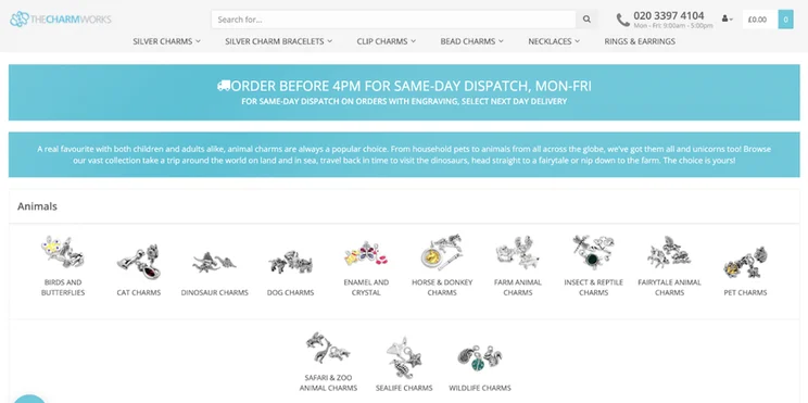 Online store The Charm Works showing charm categories such as dinosaur, cat, and sealife charms
