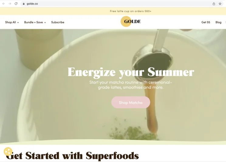 A photo of a superfood poured into a white bowl, and a headline saying "Energize your Summer".