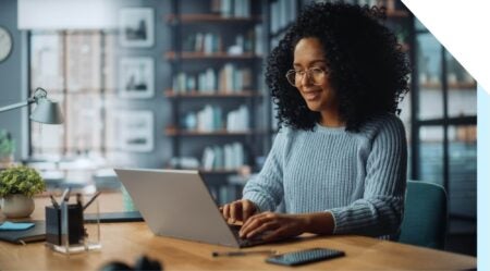 Woman working at a laptop