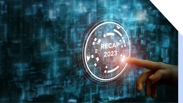 Finger pointing at futuristic circle graphic which says "2023 Recap"