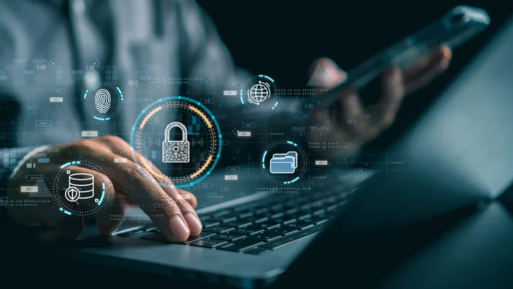 a graphic of security images and locks on a laptop