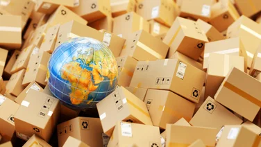 A globe surrounded by parcels.