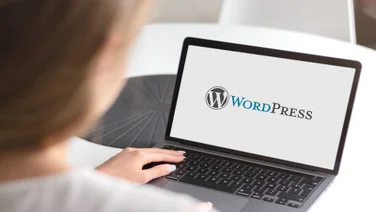 a laptop with WordPress on it