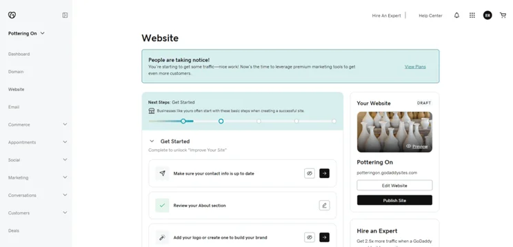 GoDaddy account dashboard for its website builder, showing a checklist of steps to help set up a website