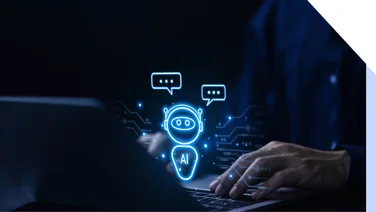 Robot hologram with the word "AI" floating in its chest, hovering above a laptop
