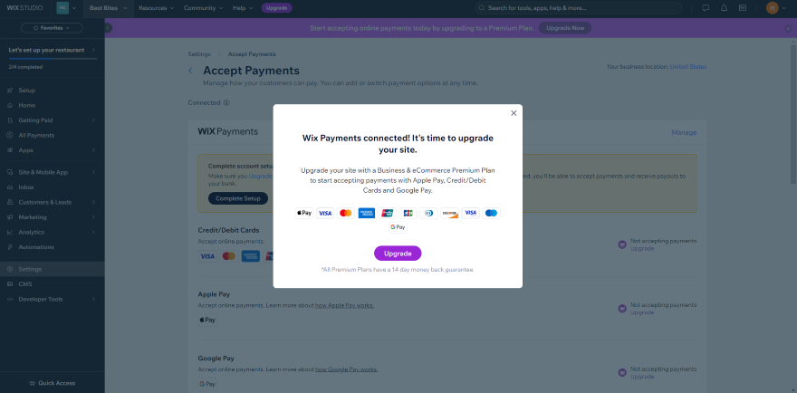 Screenshot of the Wix dashboard asking user to upgrade to a premium plan to accept payments