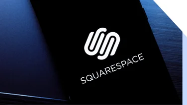 Mobile with a black screen showing the Squarespace logo