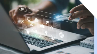 hands typing on laptop keyboard with SEO text hologram