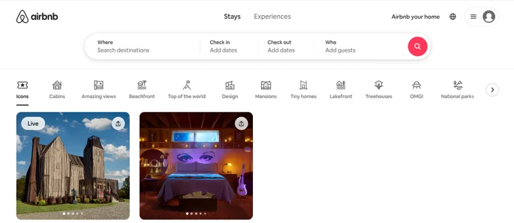 Screenshot of Airbnb's home page with navigation bar with different types of accomodation