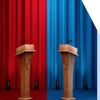 Photo of curtains with a red and blue side and podiums at each end
