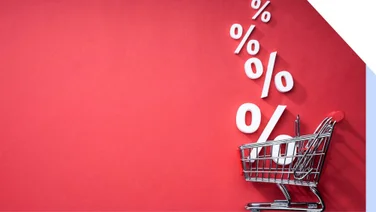 Photo of a cart with percentage signs coming out of it