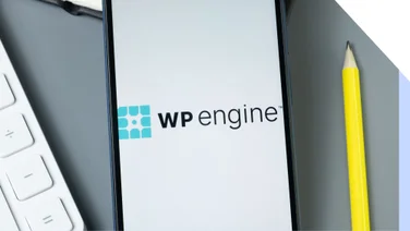 Closeup of a phone with the WP Engine logo on the screen