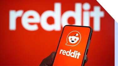 Reddit Logo on desktop and phone screens