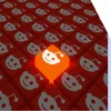 Rows of red cubes with the Reddit logo on with one cube raised higher and glowing in light