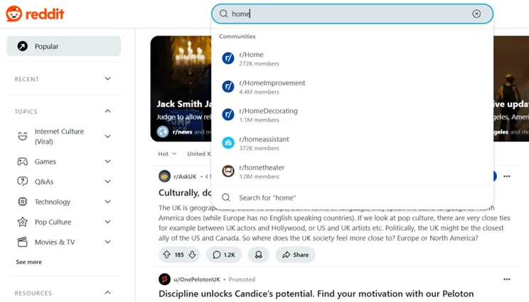 Reddit homepage with a dropdown appearing below the search bar for the term "home"