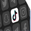 Different social media logos in black and white with the TikTok logo in colour at the centre