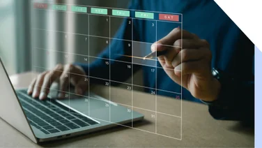 See through calendar visual floating above a laptop with a person pointing to a date