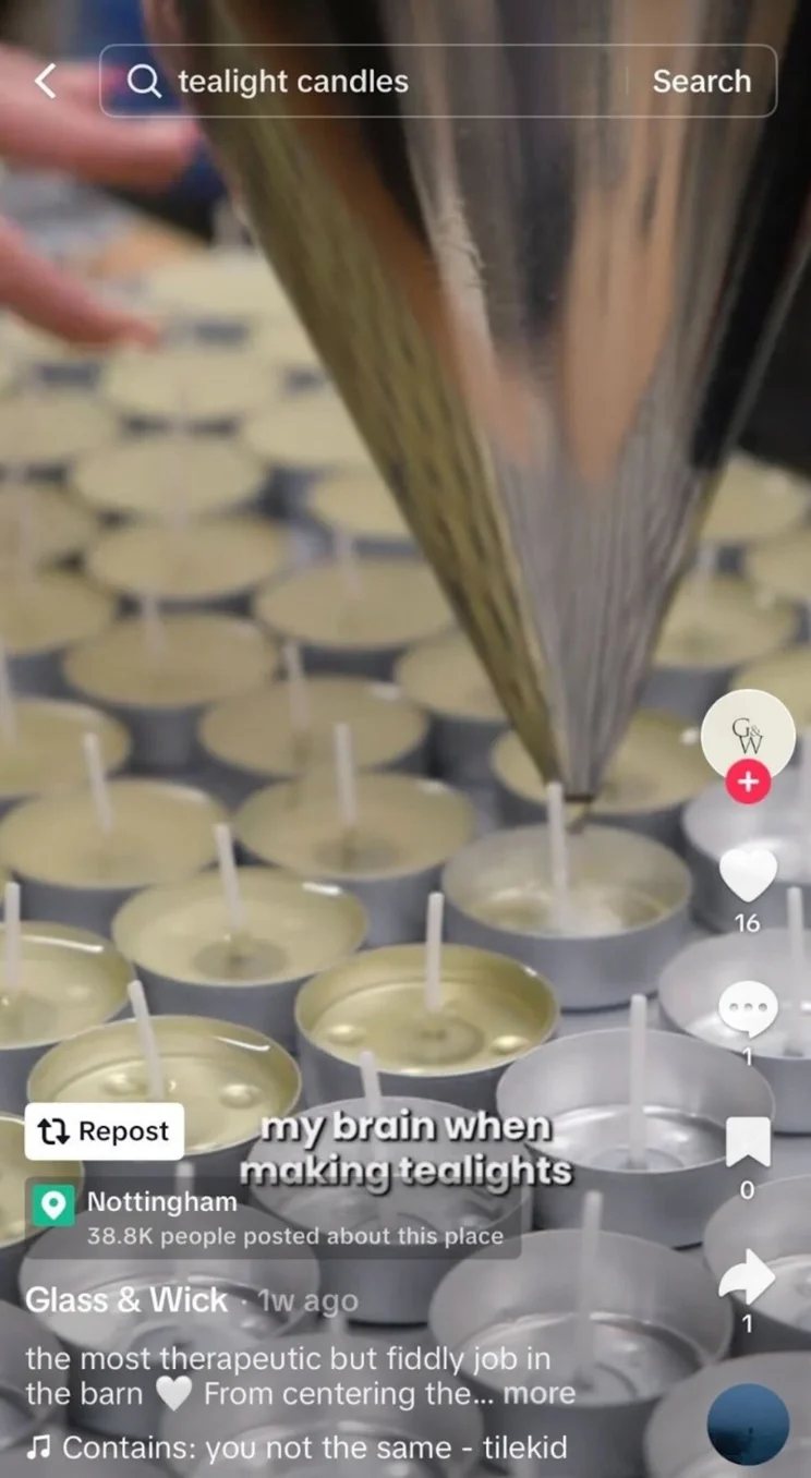 Candle wax being poured into tealights