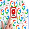 A finger pointing to a YouTube logo on top of many Google logos