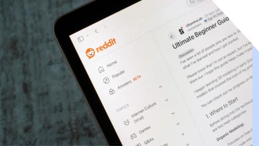 Laptop screen showing Reddit homepage