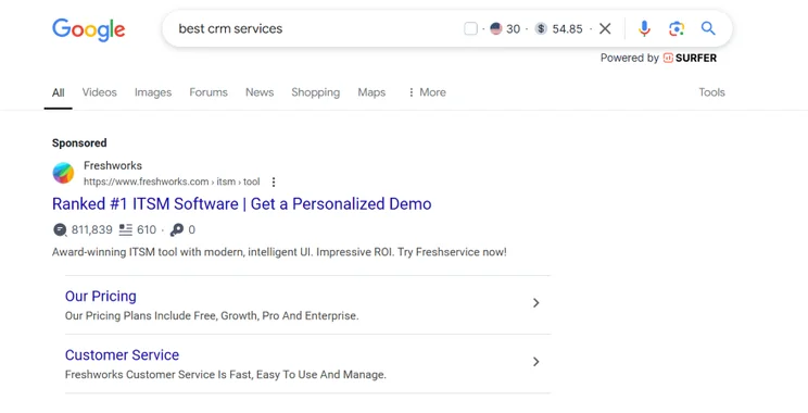 A Google search results page showing a "Sponsored" ad result for CRM software