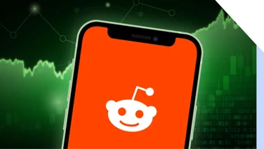 A phone with the reddit logo on screen