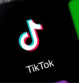 TikTok logo surrounded by other social apps