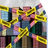 Cargo containers with yellow tape across the image showing the word "Tariffs" and the US flag