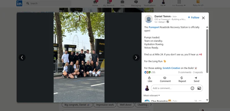 LinkedIn post of a work team standing outside and smiling for the group photo
