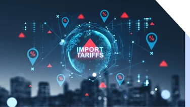blue and red graphic that says "import tariffs" overlayed on top of a blurry image of skyline