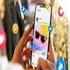 oman holding smartphone showing advertising example on Instagram
