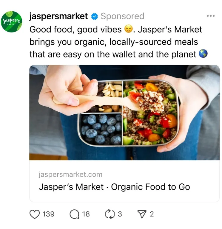 Threads ad example from @jaspersfoodmarket, showing a website link with a preview image and accompanying text