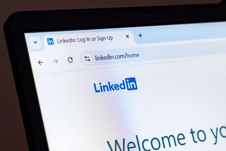 Laptop screen showing the LinkedIn login page