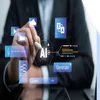man in suit tapping a pen against a graphic that says AI