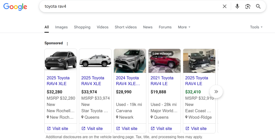 Automotive Markup Screenshot of a Google search results page for "toyota rav4," featuring various sponsored listings with prices and vehicle details.