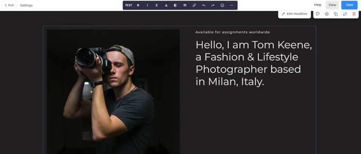 A photographer poses with a camera in a dimly lit corridor, showcasing a professional lifestyle and creative identity.
