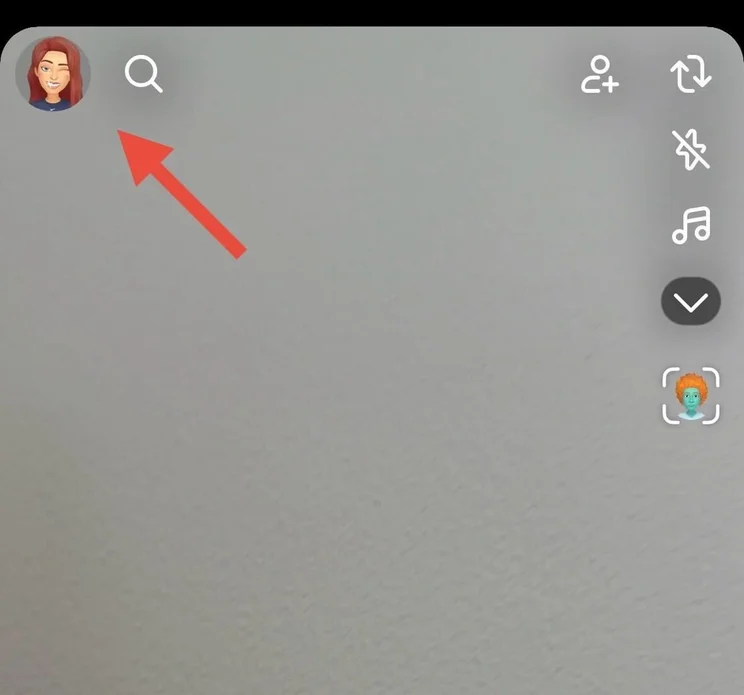 Snapchat homepage with red arrow pointing to the avatar in the top left corner