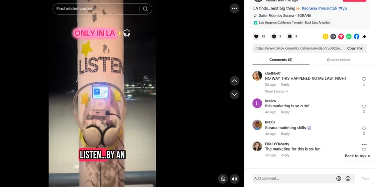 A TikTok screenshot of a colorful pole with a sign reading "ONLY IN LA" and headphones attached, promoting a unique listening experience at night.