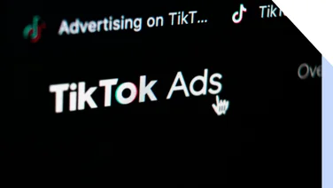 Close up of tiktok ads logo on digital screen